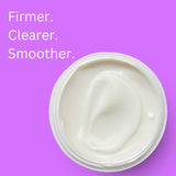 Open jar of Clear Skin Night Cream showing the cream texture on a purple background.