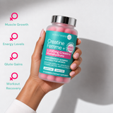 Hand holding a jar of Creatine Femme+ gummies.