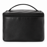 Soft Spell black PU makeup bag with carrying handle and zip closure on a white background.