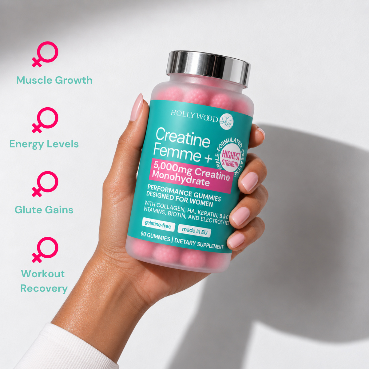 Hand holding a jar of Creatine Femme+ gummies.
