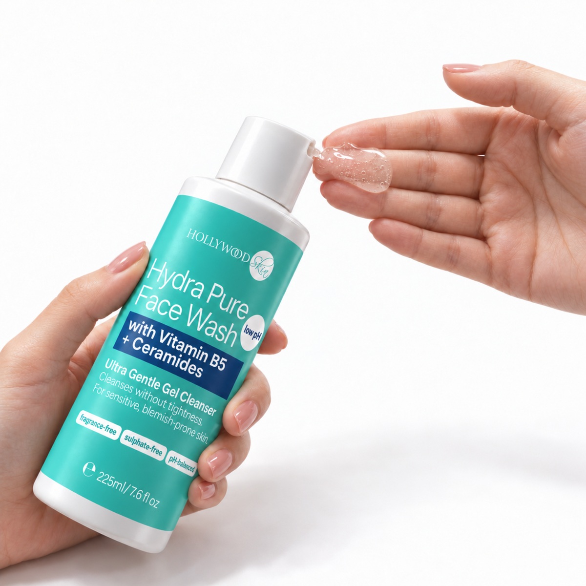 Hydra Pure Face Wash clear cleansing gel dispensed onto fingertips.